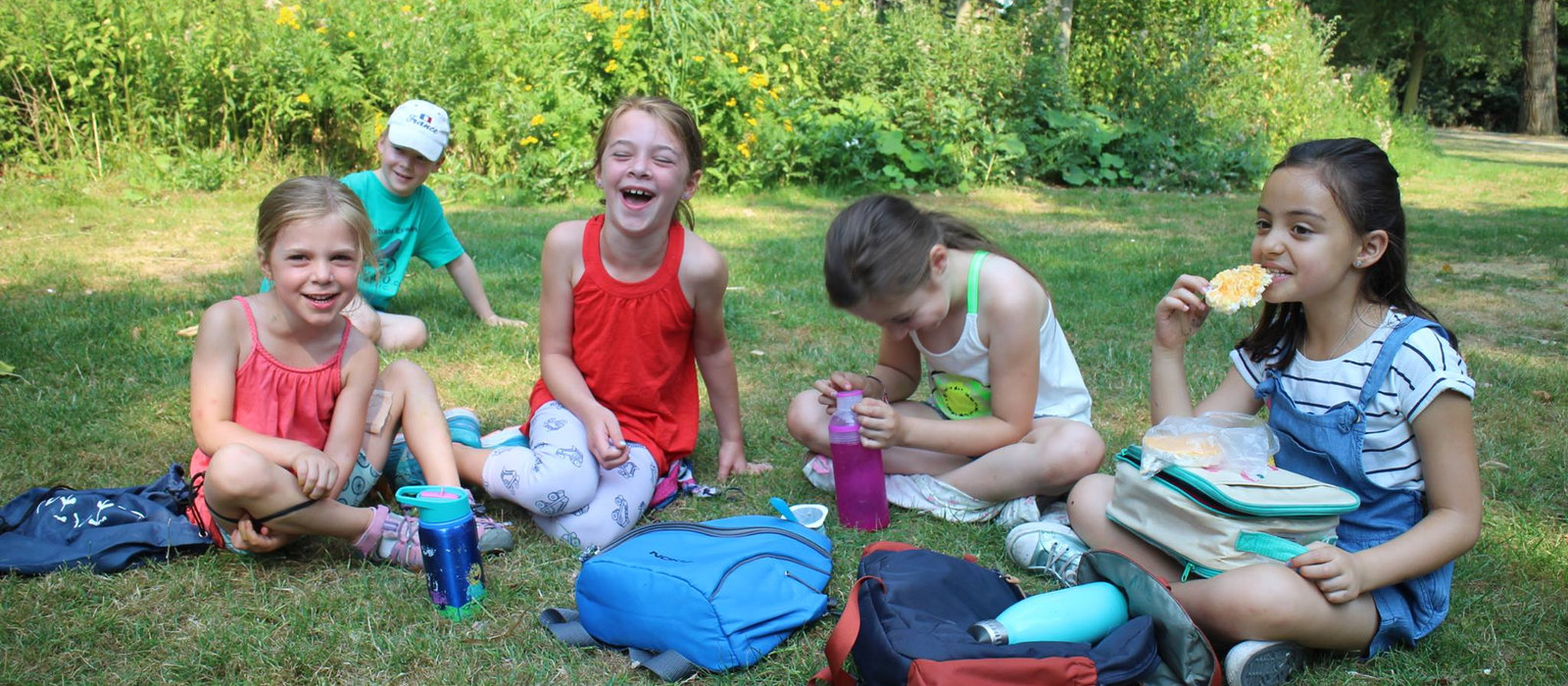 lunch time in the park, happy kids engaging